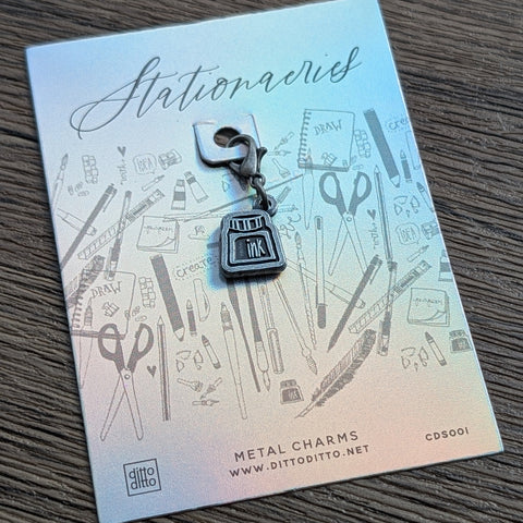 metal charm - ink