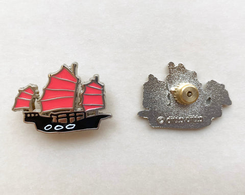 red sail enamel pin