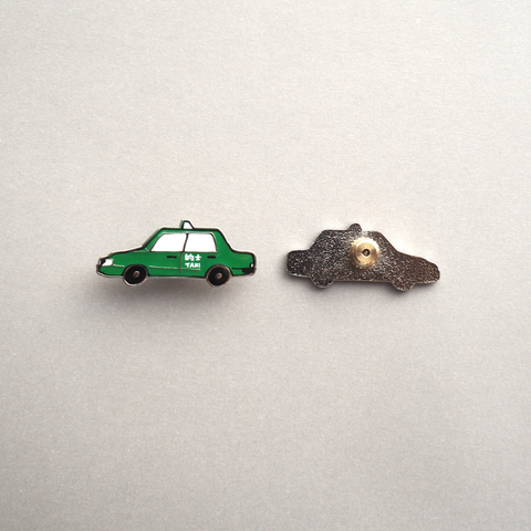 green taxi enamel pin