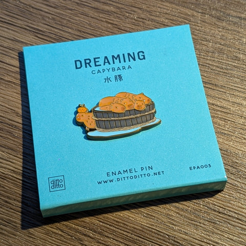 dreaming - capybara enamel pin