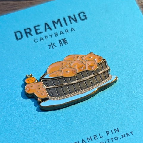 dreaming - capybara enamel pin