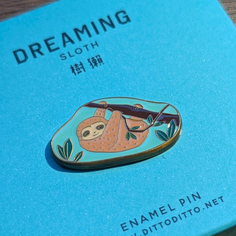 dreaming - sloth enamel pin